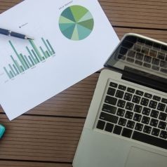 laptop and graph analyzing data